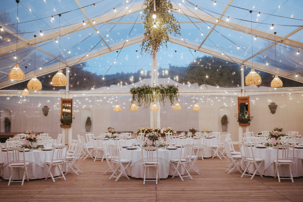Destination wedding reception design in Lisbon, Portugal Destination wedding reception under a tent in Portugal, designed and coordinated by a wedding planner in Lisbon
