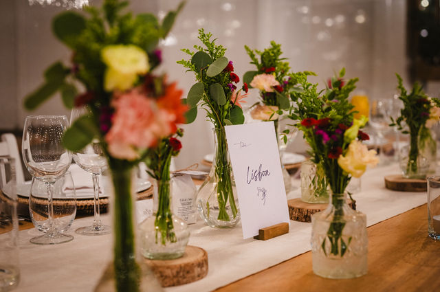 Floral table styling at a destination wedding reception in Lisbon, Portugal