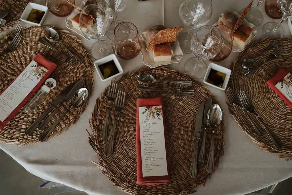 Wedding reception table setting with seasonal details at a destination wedding in Portugal