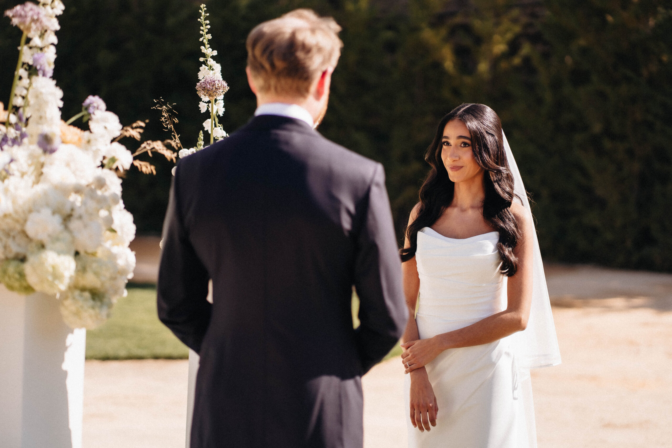 Bride and groom during an outdoor wedding ceremony in Portugal