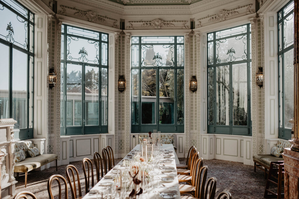 Wedding reception table inside a historic room at Pestana Palace in Lisbon